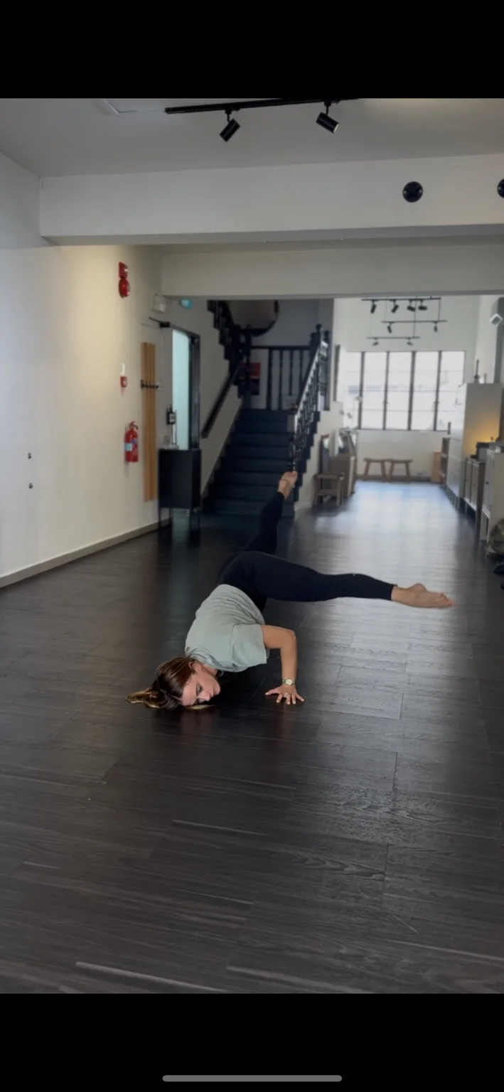 Movement coaching in studio, floor-based strength and control